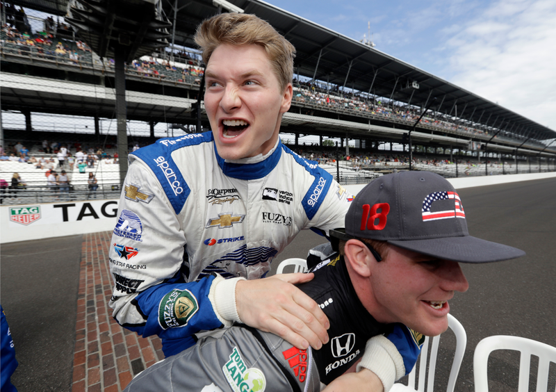 Newgarden out of costume, using Conor Daly as a horse. Photo credit: AP Images